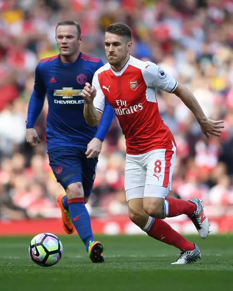 Ramsey Surges Past Rooney: Intense Moment from Arsenal vs. Manchester United, Premier League 2016-17