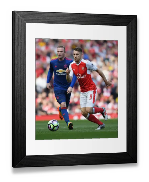 Framed Print : Ramsey Surges Past Rooney: Intense Moment from Arsenal vs. Manchester United, Premier League 2016-17 Framed Print : Ramsey Surges Past Rooney: Intense Moment from Arsenal vs. Manchester United, Premier League 2016-17