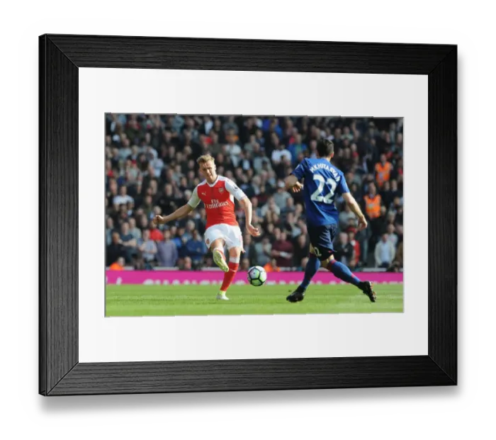 Framed Print : Arsenal vs Manchester United: Intense Battle – Holding vs Mkhitaryan