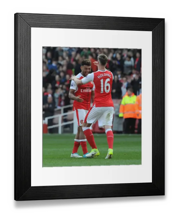 Framed Print : Arsenal: Oxlade-Chamberlain and Holding Celebrate Victory Over Manchester United Framed Print : Arsenal: Oxlade-Chamberlain and Holding Celebrate Victory Over Manchester United