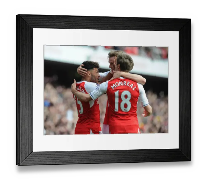 Framed Print : Celebrating Victory: Oxlade-Chamberlain, Holding, and Monreal Rejoice After Arsenal's Goals vs Manchester United (2016-17)