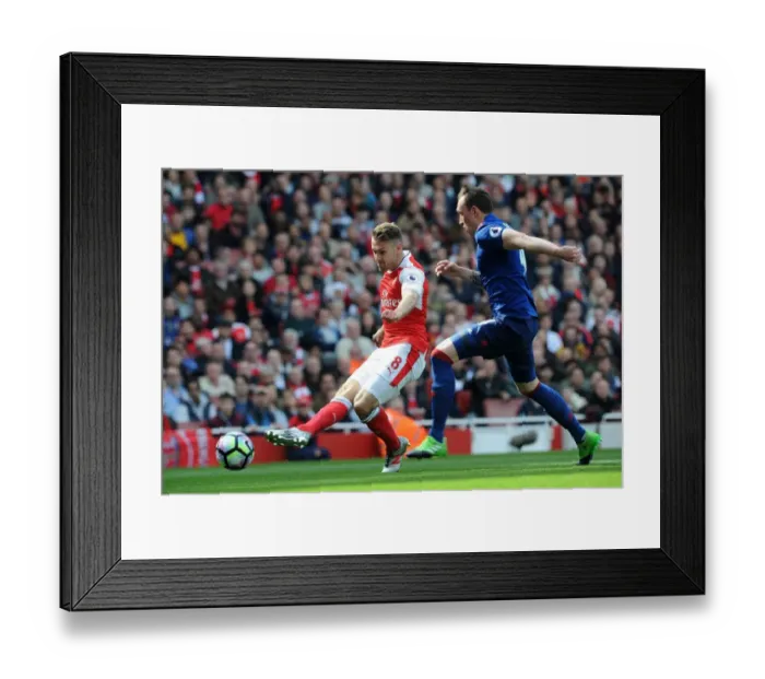 Framed Print : Ramsey vs Jones: Intense Moment at Arsenal vs Manchester United, Premier League 2016-17 Framed Print : Ramsey vs Jones: Intense Moment at Arsenal vs Manchester United, Premier League 2016-17
