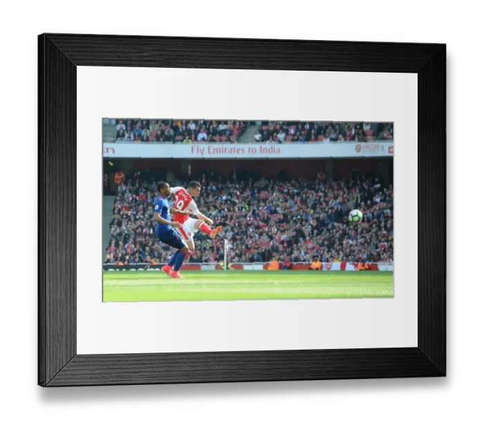 Framed Print : Xhaka Strikes: Dramatic Goal Under Martial Pressure in Arsenal vs Manchester United Clash (2016-17) Framed Print : Xhaka Strikes: Dramatic Goal Under Martial Pressure in Arsenal vs Manchester United Clash (2016-17)