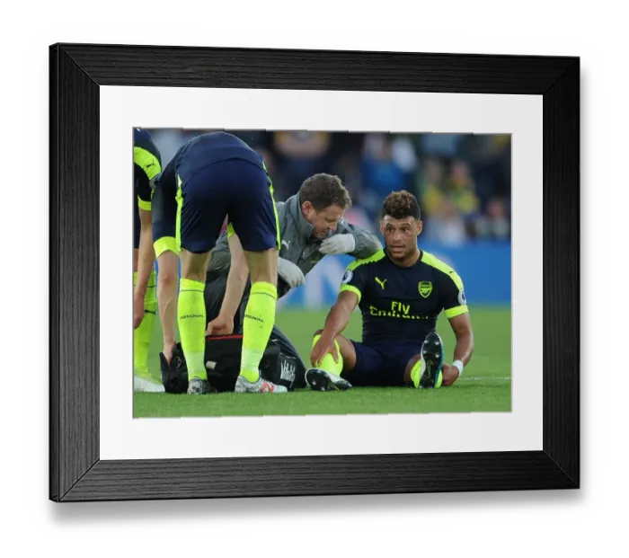 Framed Print : Alex Oxlade-Chamberlain Receives Treatment from Arsenal Physio Colin Lewin during Southampton vs Arsenal Match, 2017 Framed Print : Alex Oxlade-Chamberlain Receives Treatment from Arsenal Physio Colin Lewin during Southampton vs Arsenal Match, 2017