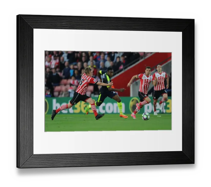 Framed Print : Intense Rivalry: Welbeck vs Ward-Prowse - Southampton vs Arsenal Clash in Premier League Framed Print : Intense Rivalry: Welbeck vs Ward-Prowse - Southampton vs Arsenal Clash in Premier League