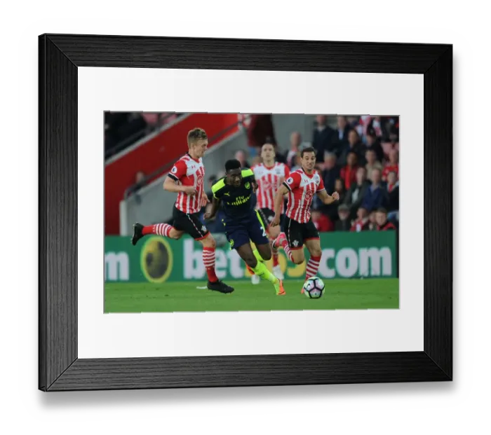 Framed Print : Welbeck vs Ward-Prowse: Intense Battle in Southampton v Arsenal Premier League Clash Framed Print : Welbeck vs Ward-Prowse: Intense Battle in Southampton v Arsenal Premier League Clash