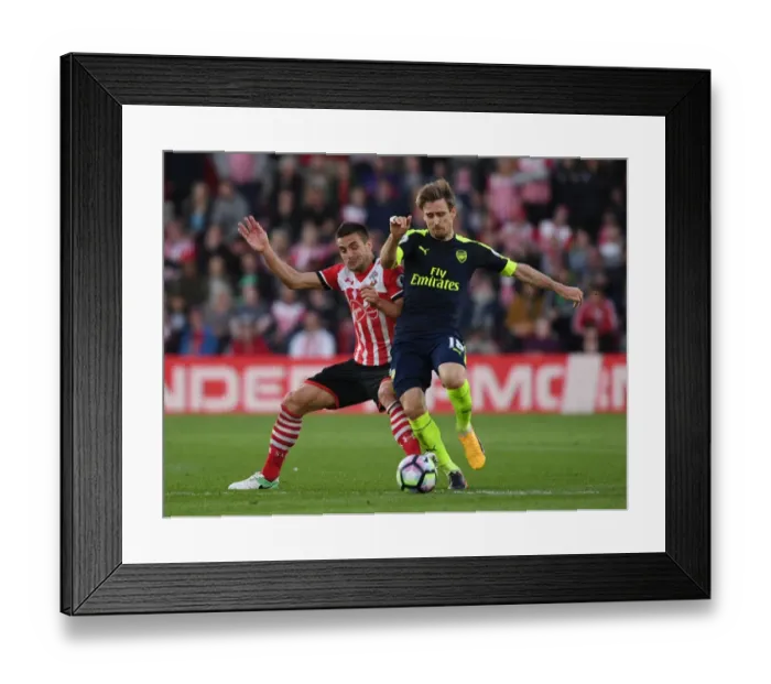 Framed Print : Monreal vs. Tadic: Intense Battle in Southampton v Arsenal Premier League Clash Framed Print : Monreal vs. Tadic: Intense Battle in Southampton v Arsenal Premier League Clash