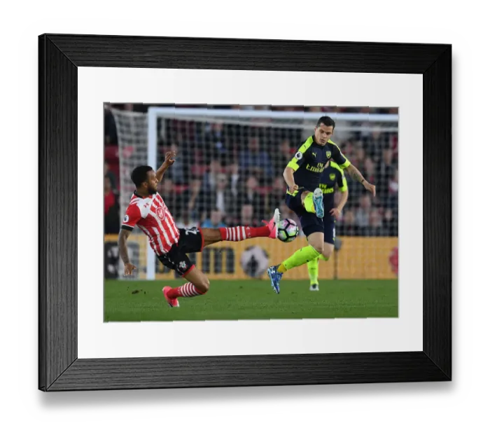 Framed Print : Xhaka vs. Redmond: Intense Clash Between Southampton and Arsenal Players