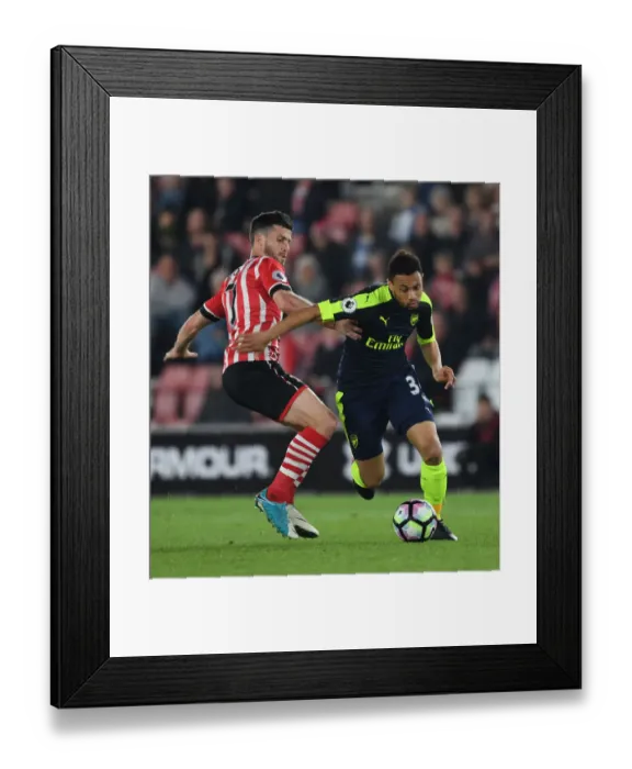 Framed Print : Coquelin vs. Long: A Fierce Battle in the Southampton vs. Arsenal Premier League Clash (2016-17)