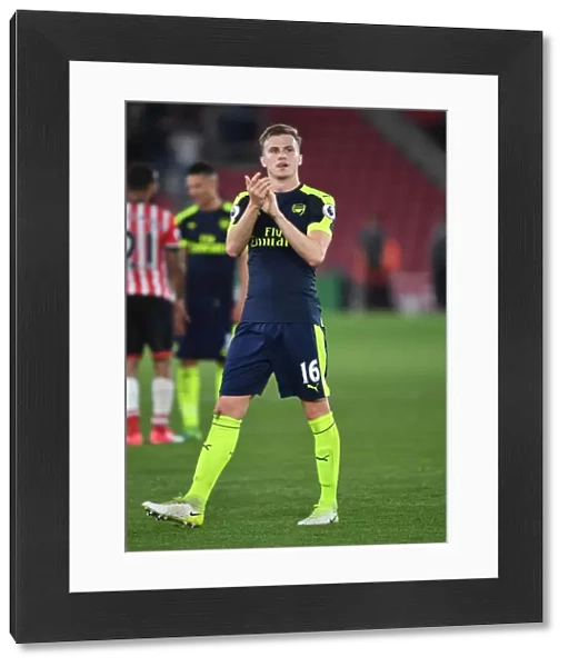 Rob Holding Celebrates with Arsenal Fans after Southampton Victory, 2016-17 Premier League