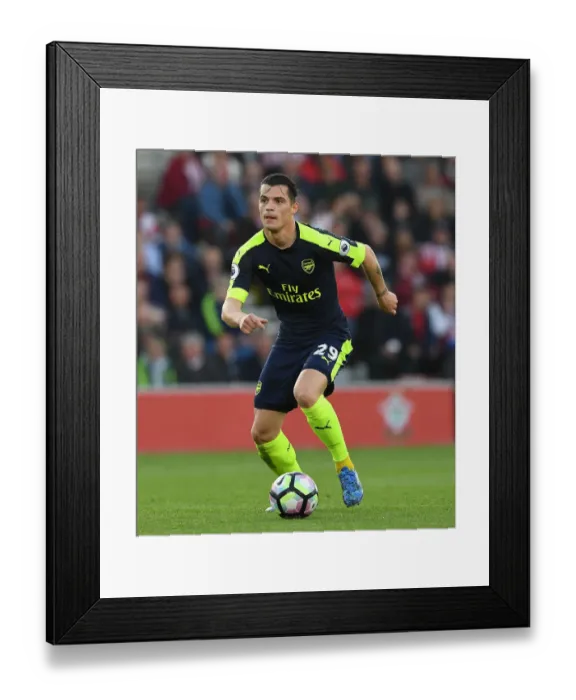 Framed Print : Granit Xhaka: Arsenal's Midfield Maestro in Action vs Southampton (Premier League 2016-17) Framed Print : Granit Xhaka: Arsenal's Midfield Maestro in Action vs Southampton (Premier League 2016-17)