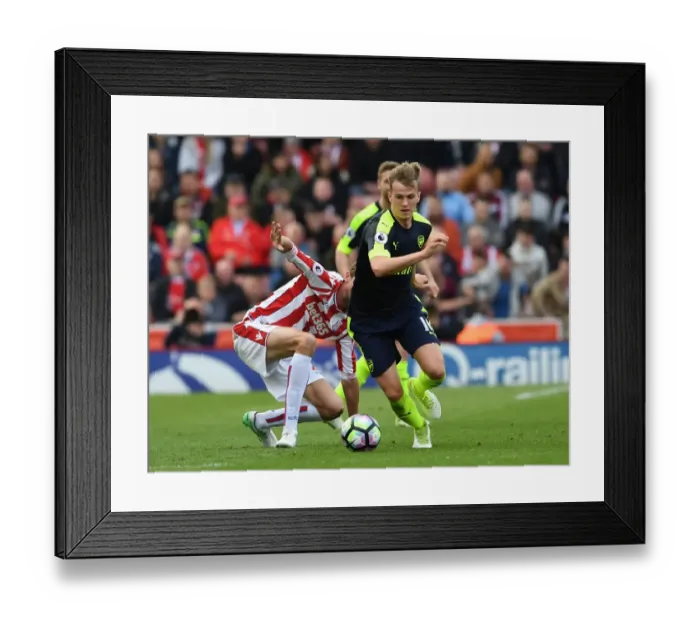 Framed Print : Rob Holding Outmuscles Peter Crouch: A Battle in the Premier League Clash Between Stoke City and Arsenal Framed Print : Rob Holding Outmuscles Peter Crouch: A Battle in the Premier League Clash Between Stoke City and Arsenal