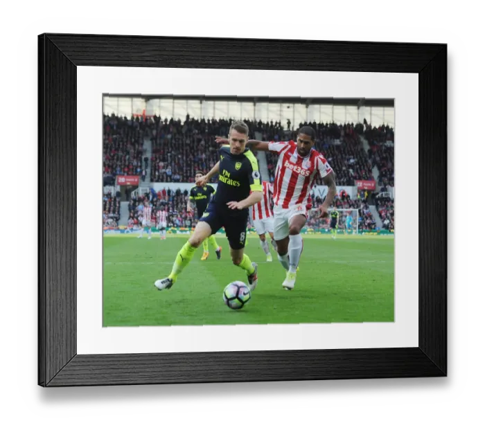 Framed Print : Aaron Ramsey Dashes Past Glenn Johnson: Intense Moment from Stoke City vs. Arsenal, Premier League 2016-17