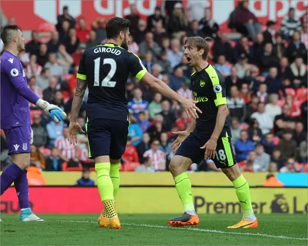Celebrating a Goal: Olivier Giroud and Nacho Monreal, Stoke City vs Arsenal, Premier League