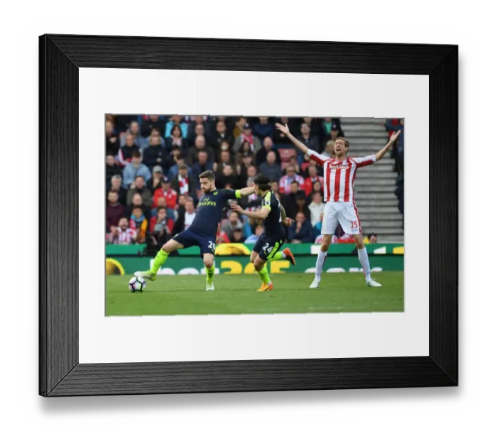 Framed Print : Mustafi and Bellerin Fend Off Crouch: Intense Moment from Stoke vs Arsenal, Premier League 2016-17 Framed Print : Mustafi and Bellerin Fend Off Crouch: Intense Moment from Stoke vs Arsenal, Premier League 2016-17