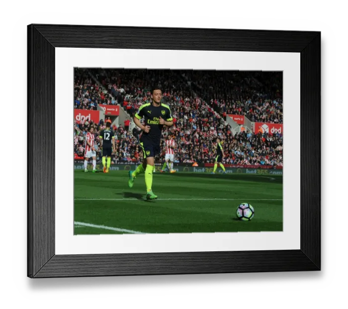 Framed Print : Mesut Ozil in Action: Stoke City vs Arsenal, Premier League 2016-17