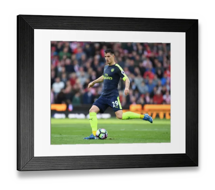 Framed Print : Granit Xhaka in Action: Stoke City vs Arsenal, Premier League 2016-17