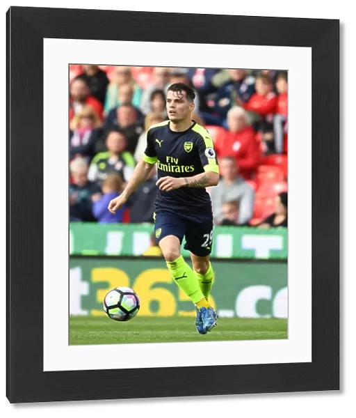 Granit Xhaka: Arsenal Midfielder in Action Against Stoke City, Premier League 2016-17
