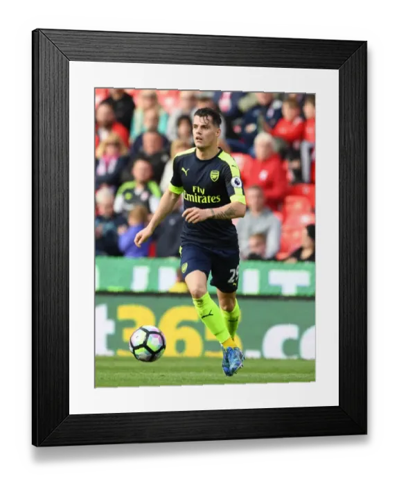 Framed Print : Granit Xhaka: Arsenal Midfielder in Action Against Stoke City, Premier League 2016-17