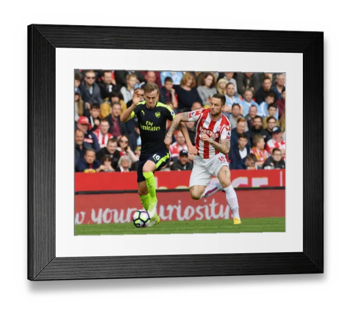 Framed Print : Clash of Forces: Holding vs Arnautovic - Stoke City vs Arsenal, Premier League Framed Print : Clash of Forces: Holding vs Arnautovic - Stoke City vs Arsenal, Premier League