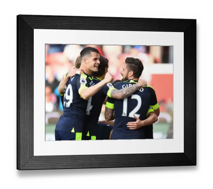 Framed Print : Xhaka, Ozil, and Giroud: Celebrating Arsenal's Goals Against Stoke City (2016-17) Framed Print : Xhaka, Ozil, and Giroud: Celebrating Arsenal's Goals Against Stoke City (2016-17)