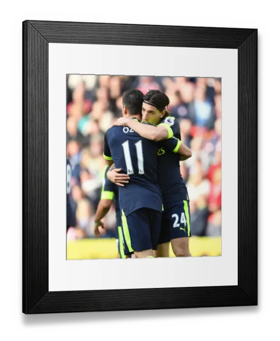 Framed Print : Arsenal's Unstoppable Duo: Ozil and Bellerin's Euphoric Goal Celebration vs Stoke City