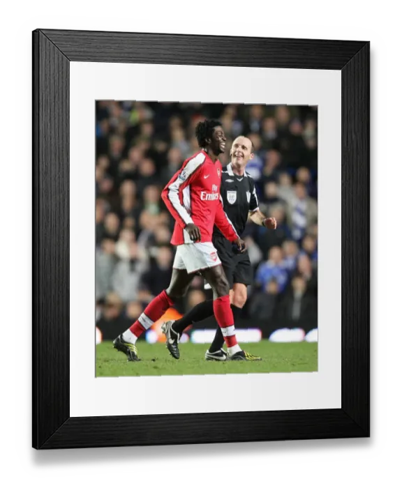Framed Print : Arsenals Emmanuel Adebayor shares a joke with referee Mike Dean