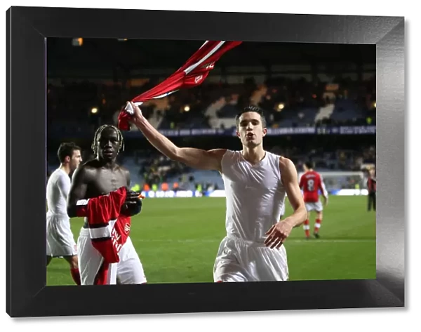 Robin van Persie celebrates the Arsenal victory after the match