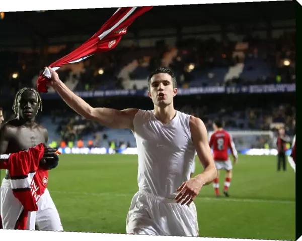 Robin van Persie celebrates the Arsenal victory after the match