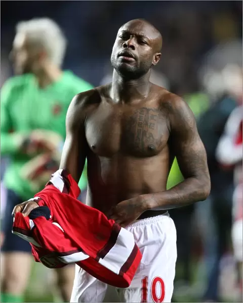 William Gallas throws his shirt to the Arsenal fans after the match