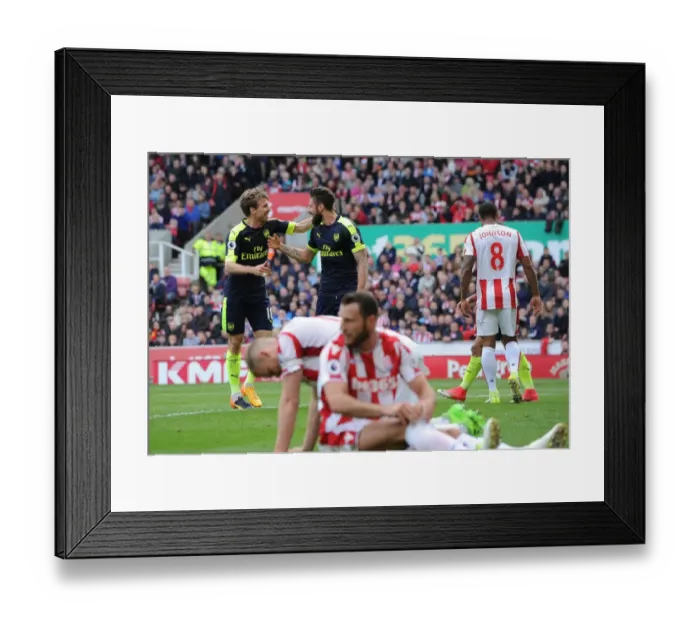 Framed Print : Celebrating Victory: Olivier Giroud and Nacho Monreal's Goal Dance (Stoke City vs. Arsenal, 2016-17)