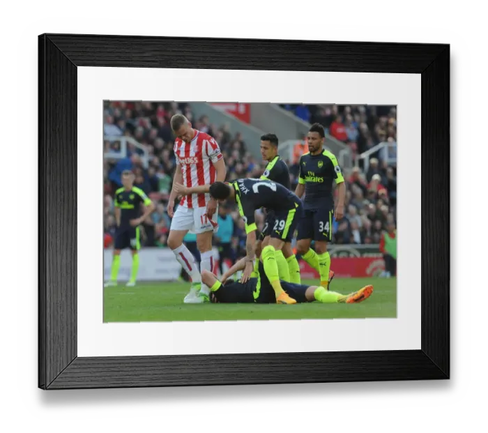 Framed Print : Sanchez and Xhaka Face Off Against Shawcross: Stoke City vs Arsenal, Premier League 2016-17