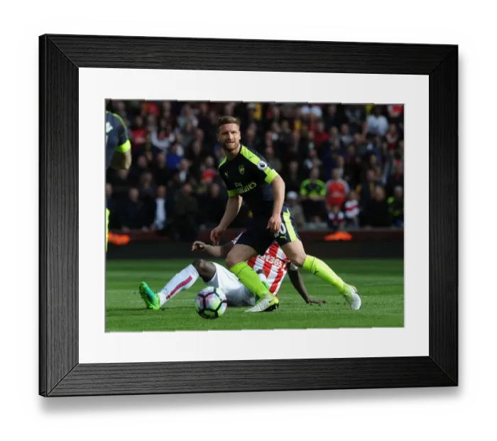 Framed Print : Shkodran Mustafi in Action: Stoke City vs Arsenal, Premier League 2016-17 Framed Print : Shkodran Mustafi in Action: Stoke City vs Arsenal, Premier League 2016-17