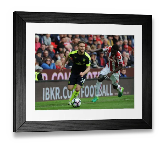 Framed Print : Mustafi vs. Diouf: A Premier League Battle Royale - Arsenal vs. Stoke City Framed Print : Mustafi vs. Diouf: A Premier League Battle Royale - Arsenal vs. Stoke City