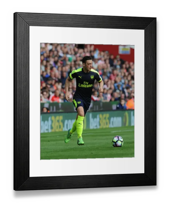 Framed Print : Mesut Ozil in Action: Stoke City vs Arsenal, Premier League 2016-17