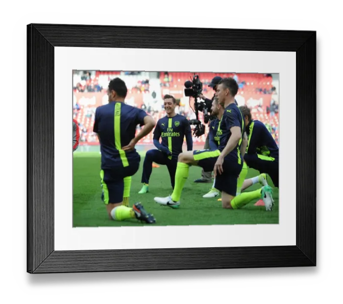 Framed Print : Mesut Ozil Prepares for Arsenal's Clash against Stoke City, 2016-17 Season Framed Print : Mesut Ozil Prepares for Arsenal's Clash against Stoke City, 2016-17 Season