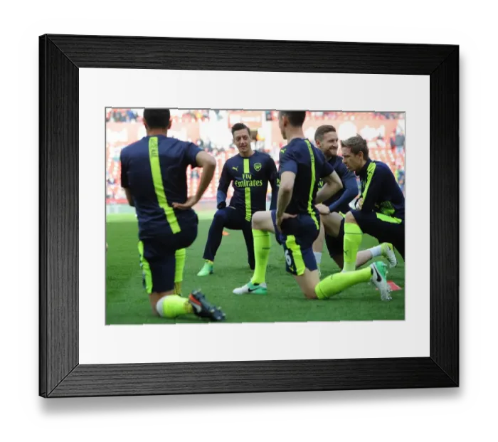 Framed Print : Mesut Ozil Gears Up: Stoke City vs Arsenal, Premier League 2016-17