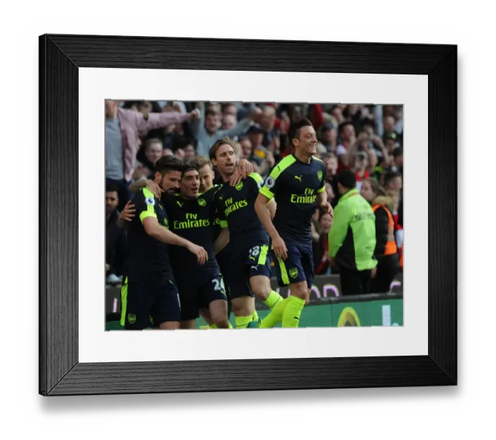Framed Print : Mesut Ozil's Brace: Arsenal's Winning Moment against Stoke City (2016-17) Framed Print : Mesut Ozil's Brace: Arsenal's Winning Moment against Stoke City (2016-17)