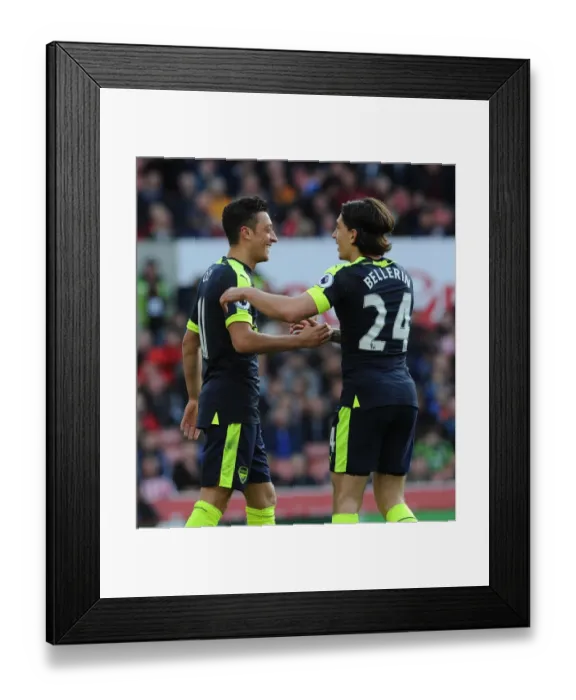 Framed Print : Mesut Ozil and Hector Bellerin Celebrate Arsenal's Second Goal vs Stoke City (2016-17) Framed Print : Mesut Ozil and Hector Bellerin Celebrate Arsenal's Second Goal vs Stoke City (2016-17)