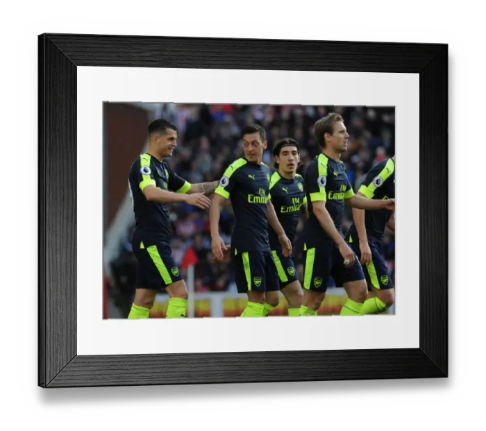 Framed Print : Mesut Ozil and Granit Xhaka Celebrate Arsenal's Goals Against Stoke City Framed Print : Mesut Ozil and Granit Xhaka Celebrate Arsenal's Goals Against Stoke City