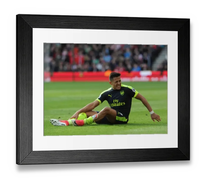 Framed Print : Alexis Sanchez's Thrilling Performance: Arsenal's Battle at Stoke City (2016-17)