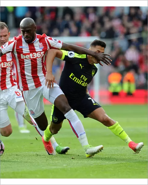 Clash of Forces: Sanchez vs. Martins Indi - Arsenal vs. Stoke City