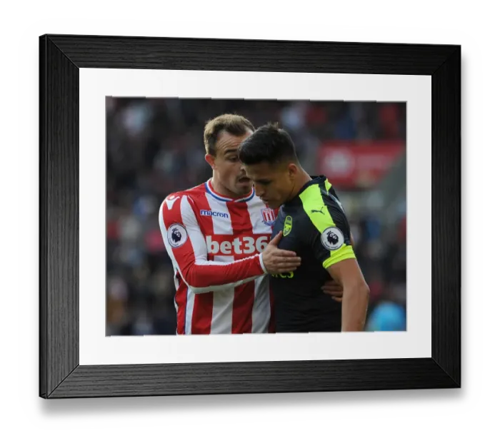 Framed Print : Sanchez and Shaqiri: A Moment of Respite Amidst the Intensity of Stoke vs. Arsenal (2016-17)