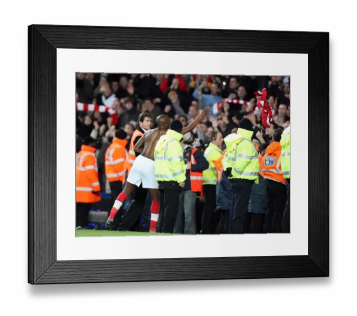Framed Print : William Gallas: Celebrating Arsenal's Victory Over Chelsea with a Shirt Throw
