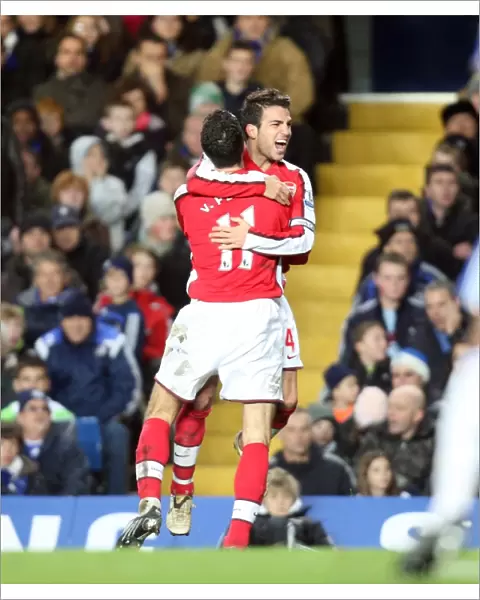 Robin van Persie celebrates scoring his and Arsenal s