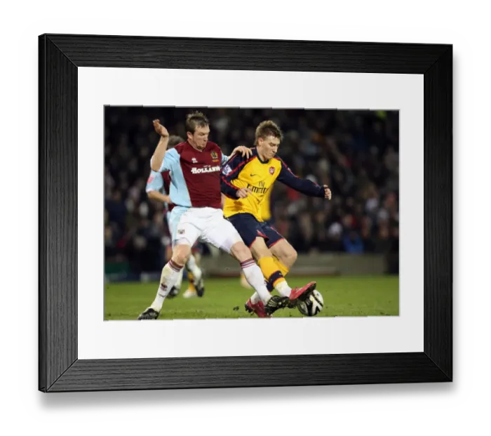 Framed Print : Nicklas Bendtner (Arsenal) Steven Caldwell (Burnley) Framed Print : Nicklas Bendtner (Arsenal) Steven Caldwell (Burnley)