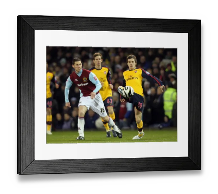 Framed Print : Aaron Ramsey (Arsenal) Chris McCann (Burnley)