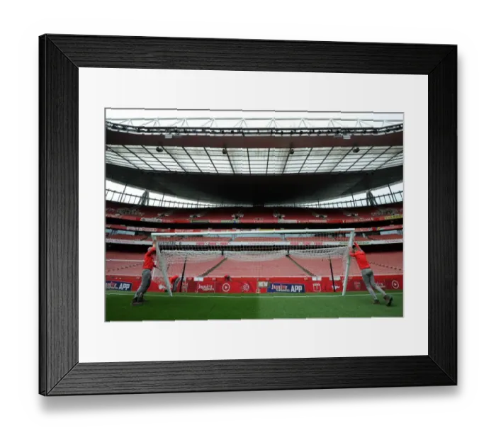 Framed Print : Arsenal Groundsman Prepares Emirates Stadium for Arsenal v Sunderland Premier League Match