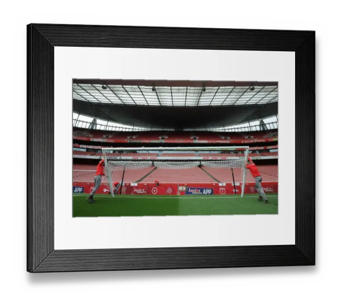 Framed Print : Arsenal Groundsman Prepares for Arsenal v Sunderland Match at Emirates Stadium Framed Print : Arsenal Groundsman Prepares for Arsenal v Sunderland Match at Emirates Stadium