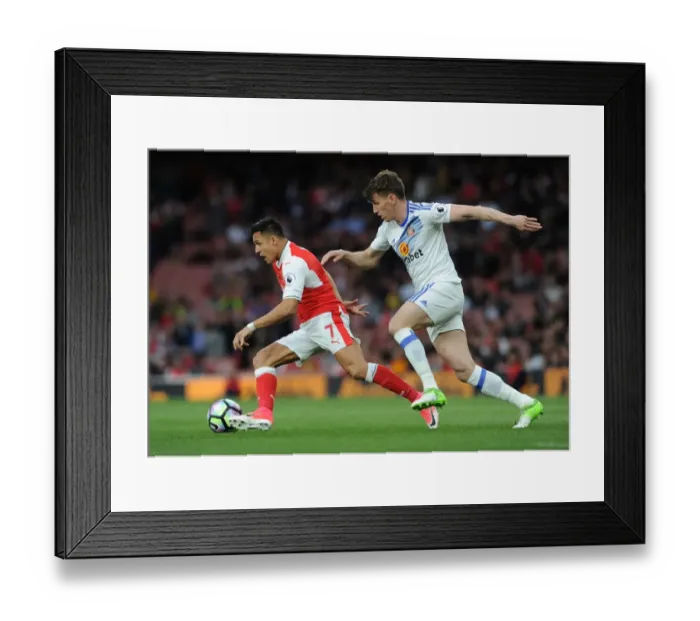 Framed Print : Intense Face-Off: Alexis Sanchez vs. Billy Jones - Premier League Battle Framed Print : Intense Face-Off: Alexis Sanchez vs. Billy Jones - Premier League Battle